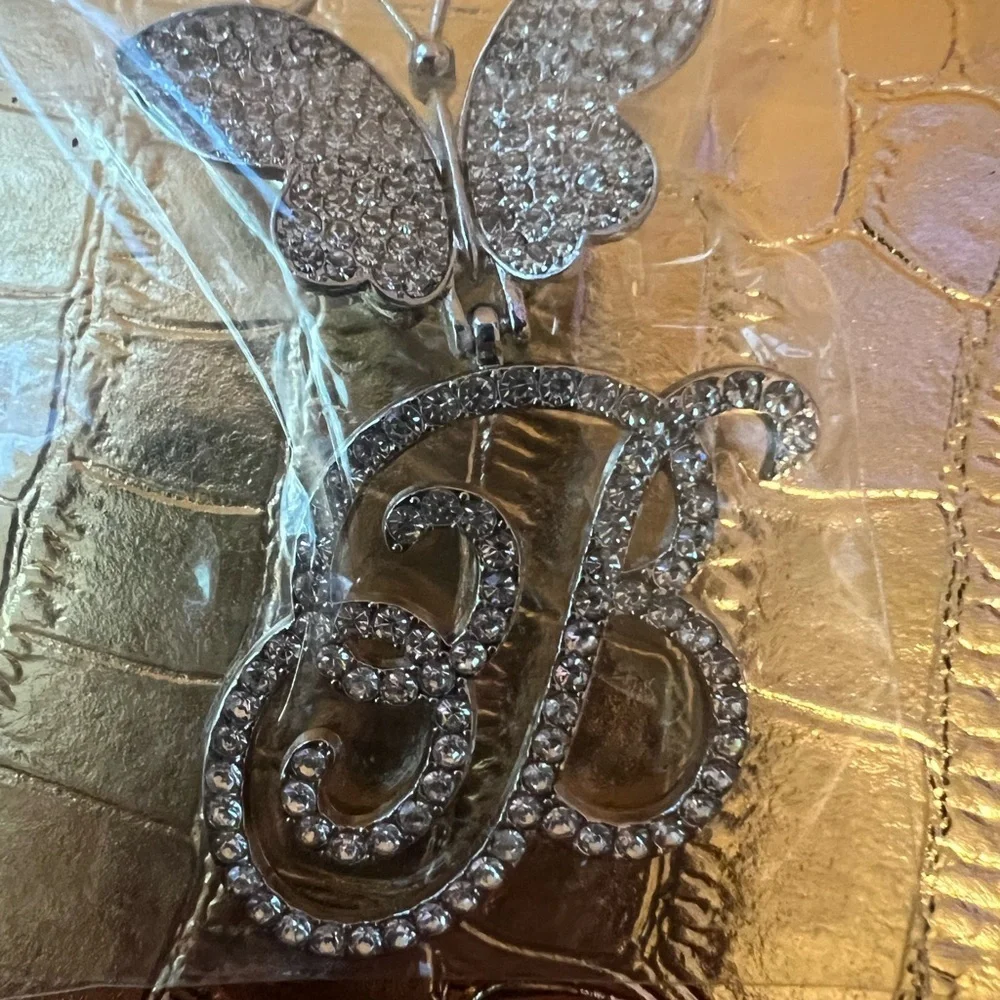 Elegant Silver “B” Butterfly Pendant